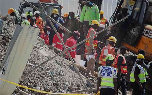Rescuers recover one body from collapsed building