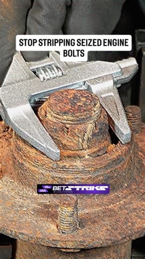 🔥​This manual impact tool succeeds where expensive power wrenches fail. The mechanic uses a handheld impact driver that converts the linear force of a hammer strike into powerful rotational torque. The cam mechanism inside the tool forces the bit downwards into the screw head to prevent cam-out while simultaneously twisting it to break the rust bond. This allows you to crack frozen fasteners loose safely without snapping them off. Save this to save your engine rebuild. ​#mechanic #restoration #