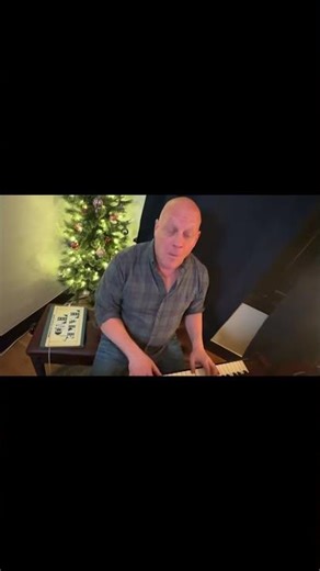 Grandma Got Run Over By A Reindeer - performed by Joshua Rich