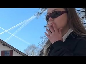 fetish girl smoking cigarette in short skirt