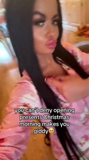 The Giddiness of Christmas Morning Present Unwrapping