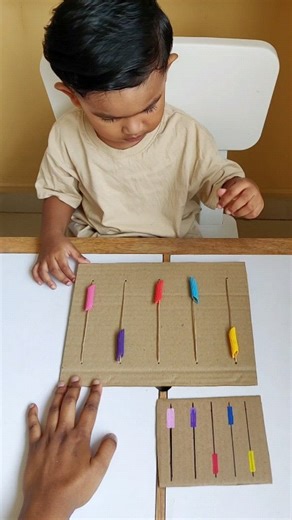 Day 3 : Let's match the pattern! So, today we tried this trendy pattern matching activity. Basically this activity is for recognising the position, Up, down and middle. Reeyansh caught the up and down position very quickly. He was bit confused with the middle position. So I skipped the middle position for this time being. Will, definitely try later with up, down and middle position together. One good thing about most home made DIY activities is that it can be reusable and helpful for age wise le