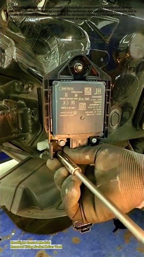 Headlight Control Module Removal Using Socket Driver Tool