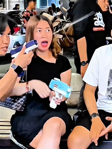 water gun prank making shocked