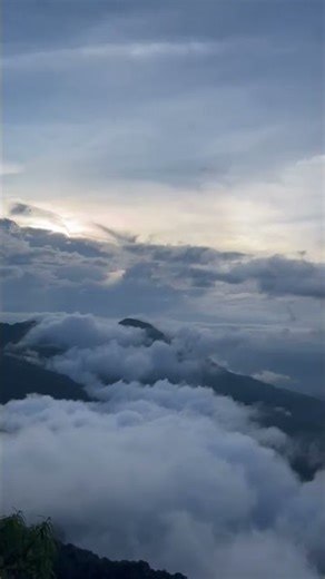 A beautiful view where cloud touch mountains🏔️ #travel #mountains #hiking #adventure #youtubeshorts