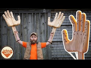 Man makes giant articulated hands out of wood