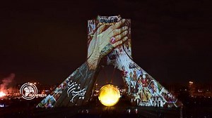 Tehran’s Azadi Tower glows on Islamic Revolution anniv