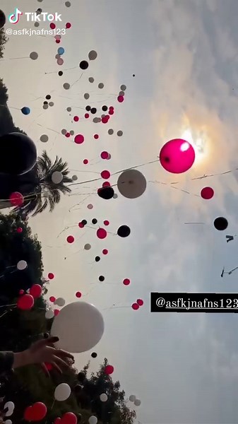 Colorful Balloon Release Celebration in Clear Sky