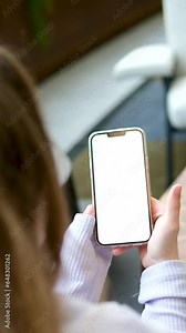 cell phone blank white screen mockup.hand holding texting using mobile on desk at office.background empty space for advertise.work people contact marketing business,technology. High quality photo