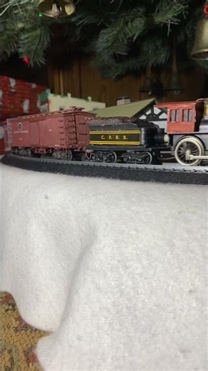 12 trains of Christmas. Vintage Mantua General 4-4-0 with some vintage Roy Rodgers.