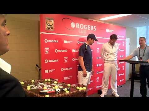 Roger Federer gets a birthday cake from Sidney Crosby