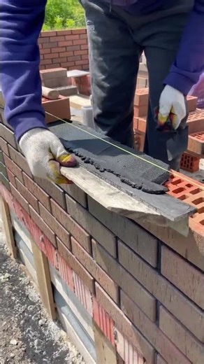 Perfect masonry process of brick walls