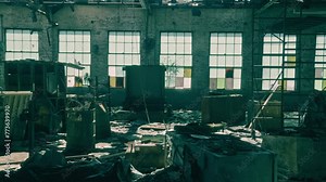 Haunting Urban Decay: Abandoned Factory in Ruins with Broken Windows and Weathered Debris