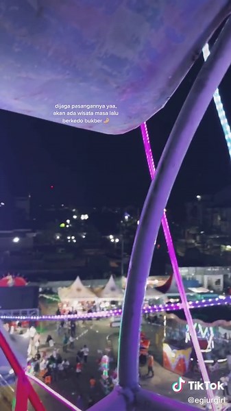 Enjoying a Night at the Colorful Carnival Fair