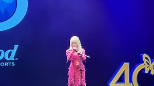 Dolly Parton surprises fans at Dollywood to kick off the theme park’s 40th season