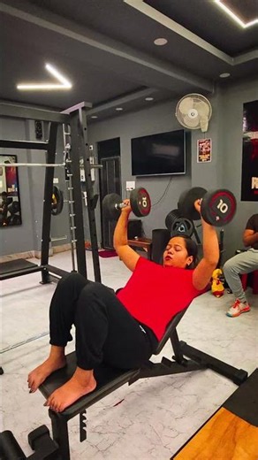 Inclined Dumbbell Press.
