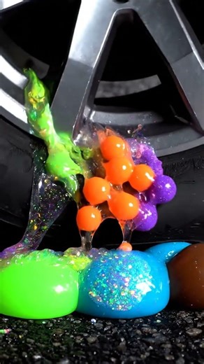 ASMR of a car tire crushing glowing alien slime pods #asmr #satisfying #vibes