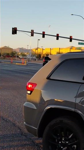 Traffic signal blinking red Rainbow and Windmill Las Vegas 3/10/26