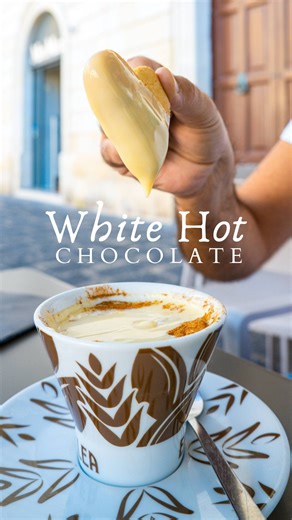 Piazza Archimede Caffè on Instagram: "Winter vibes, Ortigia style ❄️ Creamy, dreamy white hot chocolate to warm your soul. Come visit us and let us treat you to a little cup of happiness, perfect for a cozy break or a sweet moment with friends🍫✨ We’re open every day from 6 AM to 11 PM, ready to make your day a little sweeter! 📍 Piazza Archimede 22, #Ortigia – Siracusa"