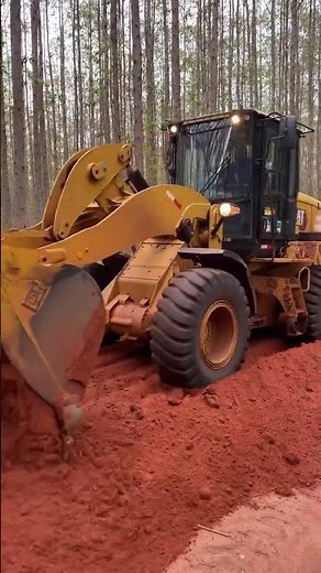 This Loader Bucket Levels Ground While Reversing