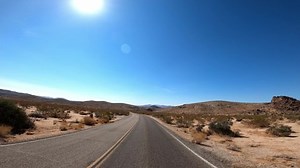 clip-1096845743-joshua-tree-61-california-desert-driving-pov