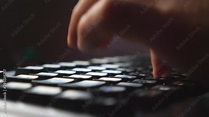 Close up of male fingers pressing buttons on computer keyboard. Unrecognizable freelancer working at new project using pc typing text on pc. Productive night work. Blurred background. Slow motion