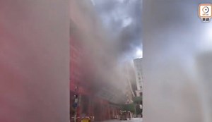 A fire at World Trade Center in Hong Kong traps hundreds of people on roof, 1200 people evacuated