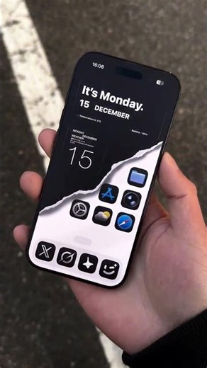 Black & White Ripped Wallpaper, dark square icons, and simple info widgets.