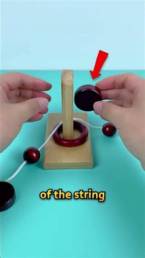 How to Solve the Ring and String Puzzle