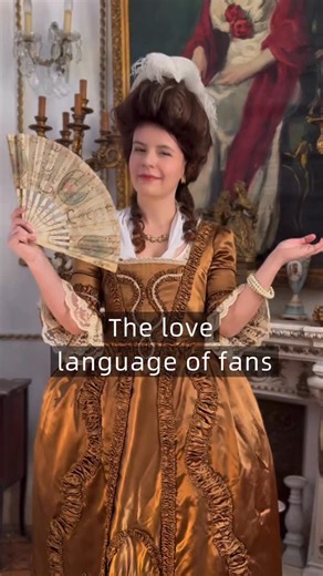 In the 18th century, a fan was more than just an accessory😍 it was part of social etiquette. At a time when women couldn’t always speak openly, a small gesture could say far more than words. Touching the fan to the cheek could suggest interest, snapping it shut might signal disapproval, and slow fanning hinted at subtle flirtation. It wasn’t a single universal “secret code,” but rather a fashionable salon game that later became even more popular in the 19th century. Sometimes, one movement of t