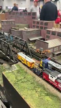 HO Scale Trains Running on a Bridge