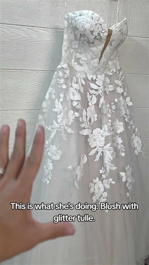 The Big Debate on Wedding Dress Colors: Blush or Ivory? Bride also added leg slit + neckline