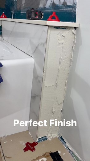 How to finish tile around the tub. #diy #work #construction #home improvement #homerenovation #bathroomremodel #tutorial #contractor #hardwork #tools | WINNI