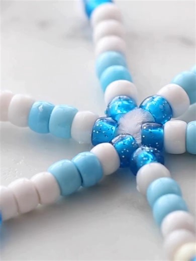 Beaded Snowflake Craft...sparkly, simple, and perfect for winter fun! #kidscraft #wintercraft