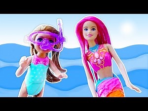 Barbie baby doll and Barbie Mermaid play at the water park