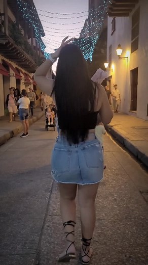 Walking Through a Festive Evening Street Scene