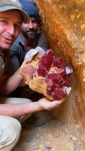 Uncovering Red Quartz Crystals from the Rock Wall