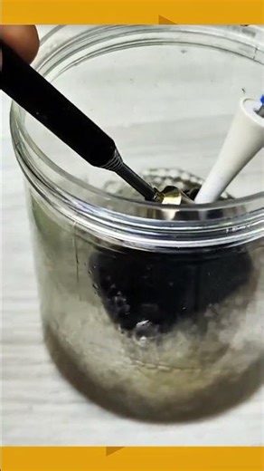 Rust removal process by dipping metal objects into a rust cleaning solution #DIY #shorts