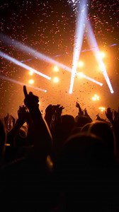 Vibrant Live Concert with Confetti and Stage Lights over Audience | Premium Stock Video Footage