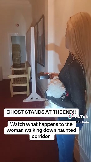 Woman Encounters Ghost in Haunted Corridor