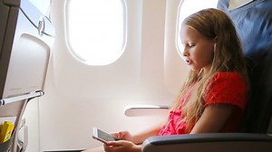 Adorable Little Girl Traveling By Airplane Stock Footage Video (100% Royalty-free) 1022946985 | Shutterstock