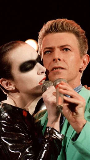 CBS Mornings on Instagram: "@officialannielennox said she made David Bowie do a double-take when she arrived in what she called an armor-like dress and sharp black eye makeup for their duet at the Freddie Mercury Tribute Concert in 1992. Thankfully, she recalled, the choice paid off: “It was thrilling.”"