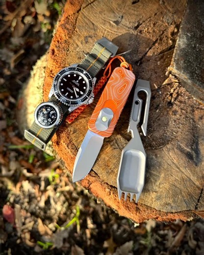 Prometheus Design Werx on Instagram: "CAS-OTF Topo Map Edition. Also shown is our Gen 2 Ti-MNPARA with heavier duty elastic, in one of our new colorways, and now featuring a split buckle for easy threading to fixed bar watches, and upcoming Ti-Spork Chop. #prometheusdesignwerx #titanium #edc #carrysmarter #otf #knife #rolexsubmariner #marinenationale #spork"