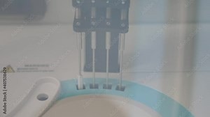 Modern blood testing device working and checking blood quality inside of it.