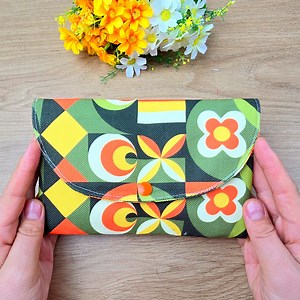 9.6K views · 101 reactions | Easy & cute daisy wallets for everyday use ✨#HandmadeWallet #SewingProject #DIYClutch #FabricWallet #EasySewing | Hobby Knitting | Facebook