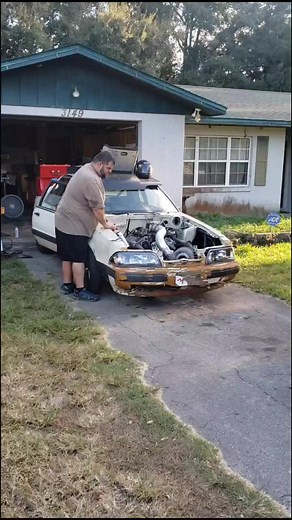 Car Repair Tips: Examining a Ford Sedan Engine