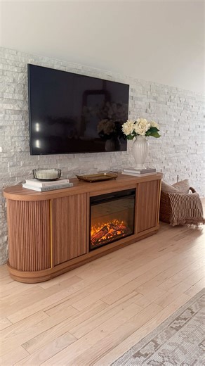 I’ve been searching for the perfect media console with a fireplace, and this one truly stopped in my tracks. The warm wood, curved detail, hidden storage, and cozy glow completely changed the vibe of our bedroom. 🔥🤎 #amazonfinds #founditonamazon #fireplace #cozybedroom #neutralhome