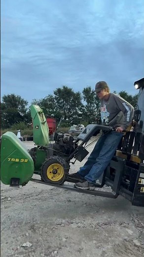 John Deere snow blower takes a ride