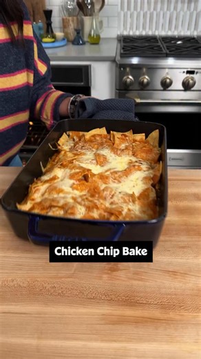 Chilaquiles meets enchiladas meets nachos in this Chicken Chip Bake! 😋 This one is a winner no matter what day of the week. Tap the link in @allrecipes bio to get the recipe, or keep reading: Ingredients: 3 1/2 cups chopped cooked rotisserie chicken 1 (10 ounce) can green enchilada sauce 16 ounces Monterey Jack cheese, shredded, divided 4 green onions, sliced, divided 1 tablespoon olive oil 14 ounces thick-cut homestyle tortilla chips 1 (15 ounce) can pinto beans, drained and rinsed 2 (10 ounce