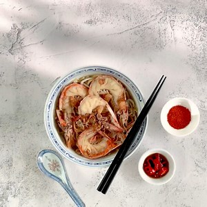Taste the very best of local hawker fare in the skies. As part of our Singapore Showcase, a selection of our finest hawker dishes prepared by SATS are now available on board our First and Business Class menus on selected flights departing Singapore. Mention the best prawn noodles in Singapore and Beach Road Prawn Noodle House comes to mind. Enjoy their succulent prawns and rich broth that embodies years of heritage and tradition. | Singapore Airlines